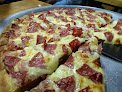 Negocio Capiro's Pizza De La 47