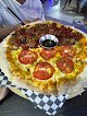Infamous Pizza FÉlix Cuevas